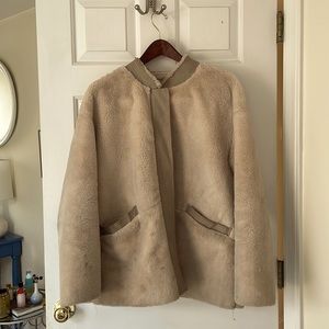 Cream colored faux fur coat